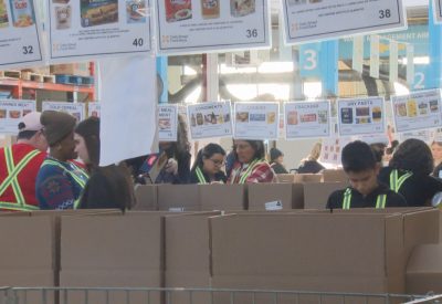 People and boxes at food bank